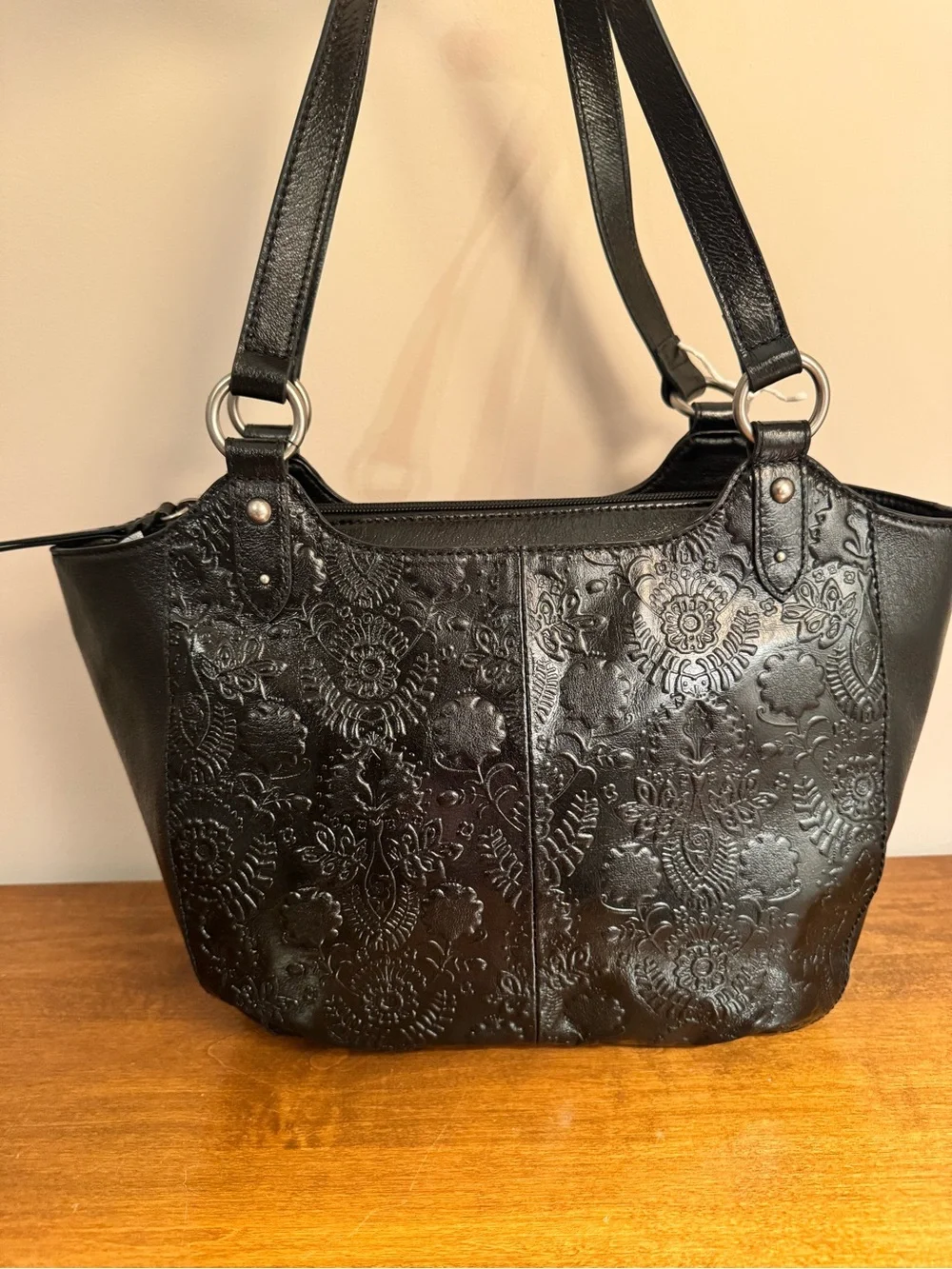 The Sak Bolinas Satchel in Black Floral Embossed Leather